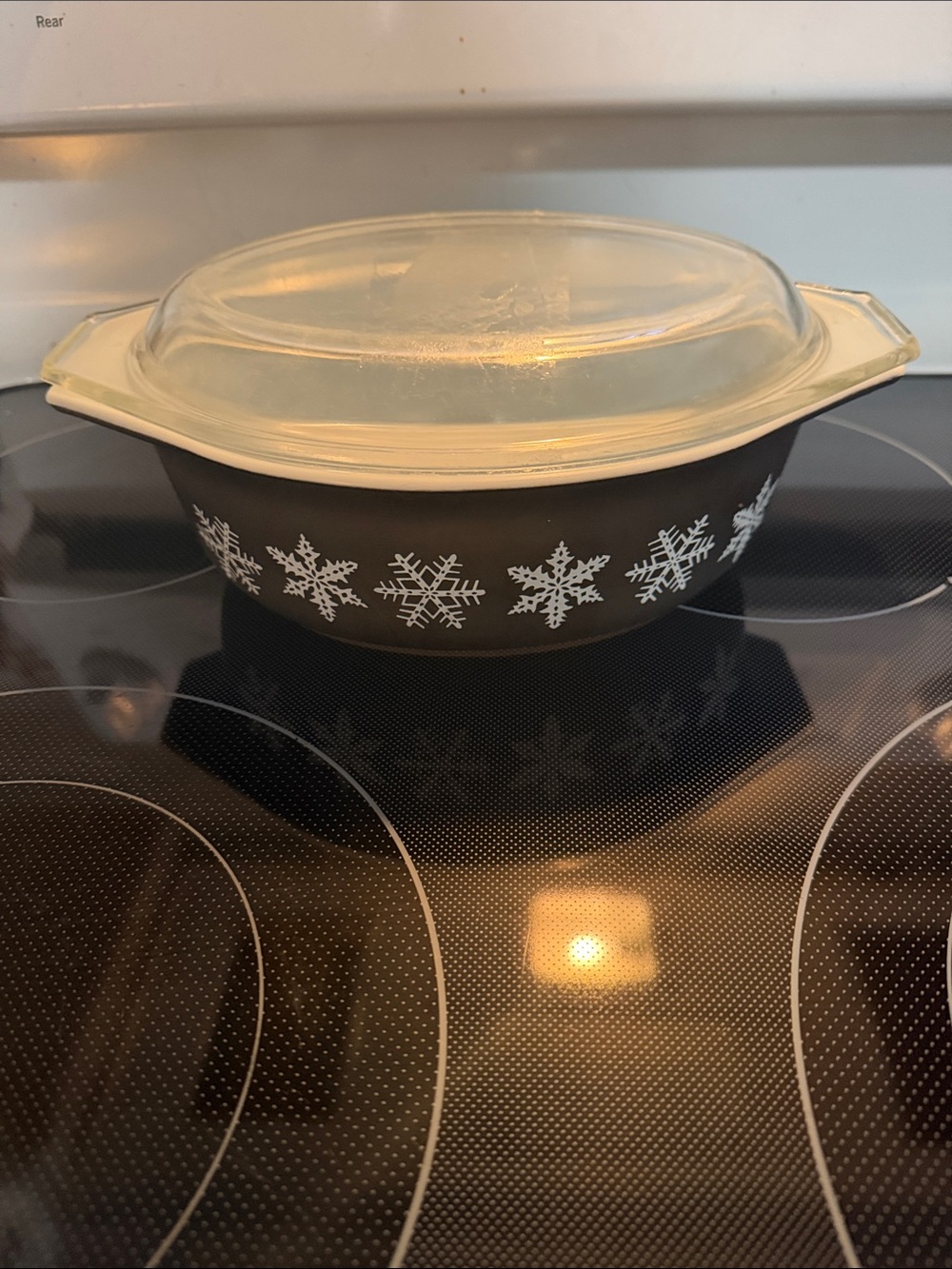 Pyrex Black Casserole with White Snowflake Pattern and Clear Lid
